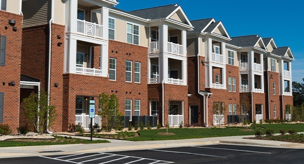 A suburban apartment building during the day