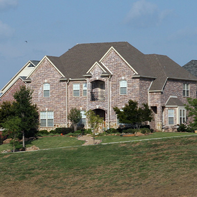 Exterior of brick home in Dallas by Platinum Painting