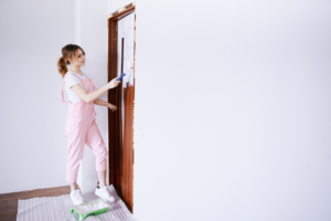 a closeup of an older home being repainted