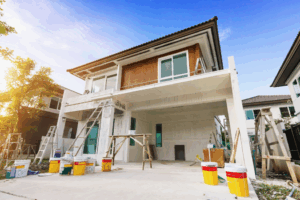 the exterior of a house being painted
