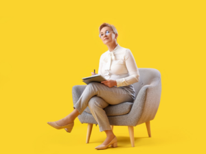 a business owner sitting in a yellow room